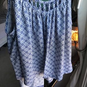 Blue and white floral cropped tank top.